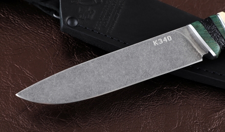 Нож Пантера сталь К340, рукоять карельская береза резная черный граб Нож Пантера сталь К340, рукоять карельская береза резная черный граб