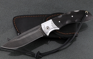 Складной нож Беркут, сталь дамаск, рукоять накладки черный граб с дюралью Складной нож Беркут, сталь дамаск, рукоять накладки черный граб с дюралью